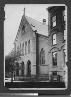 1906 black and white photograph of Our Lady of Mercy Church on Debevoise Street.