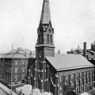 Aerial view of St. Peter's Church and academy, showing corner of Hicks and Warren Streets.