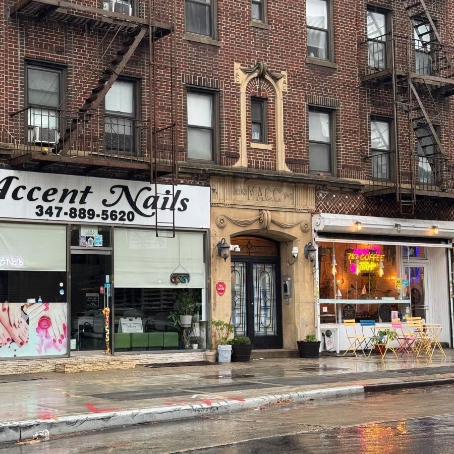 Close up view of the base of 597 Metropolitan Avenue, an apartment building in Williamsburg, Brooklyn.