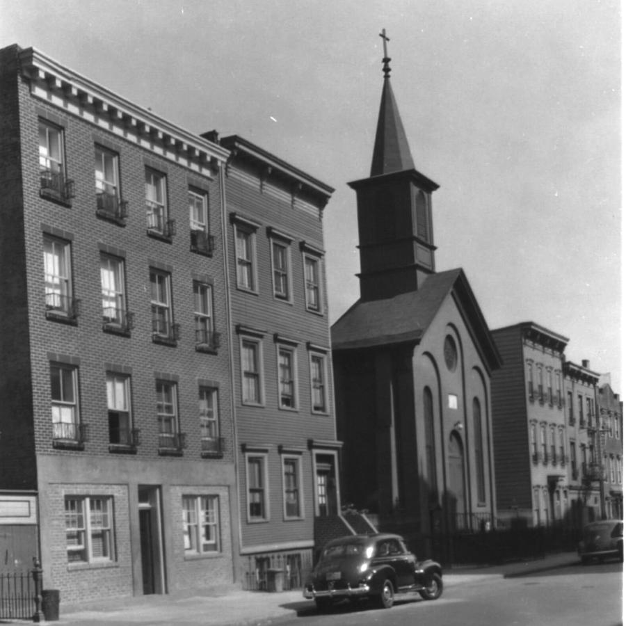 1941 view looking east on North 5th Street showing St. Matthew Church with spire intact.