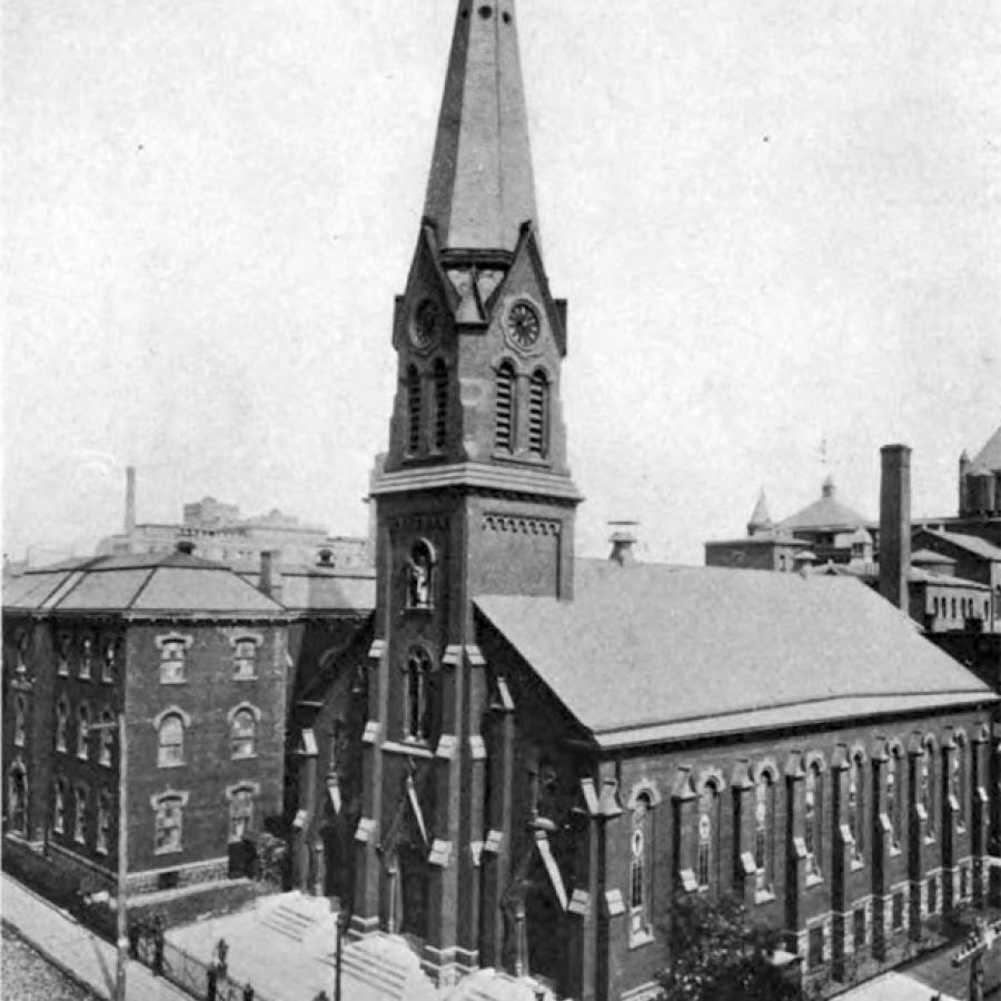 Aerial view of St. Peter's Church and academy, showing corner of Hicks and Warren Streets.